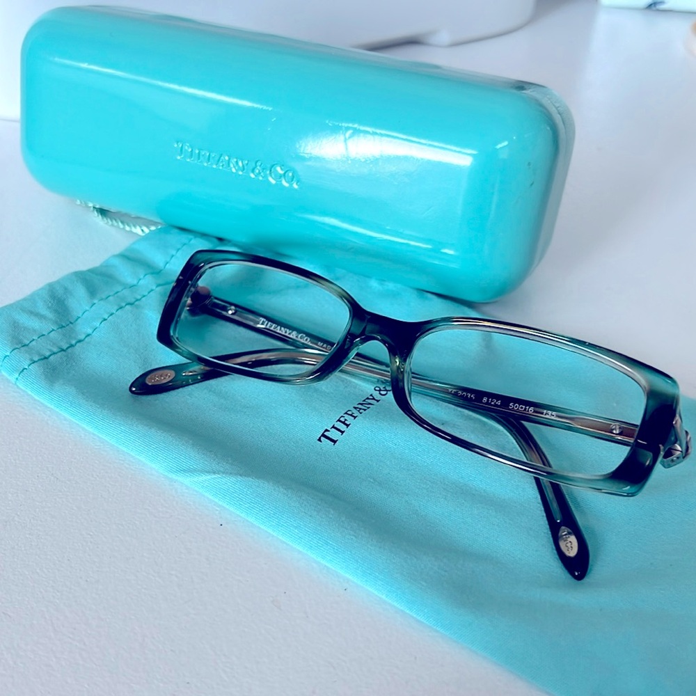 Prescription glasses, Tiffany & Co. brand. Blue/green transparent color.
